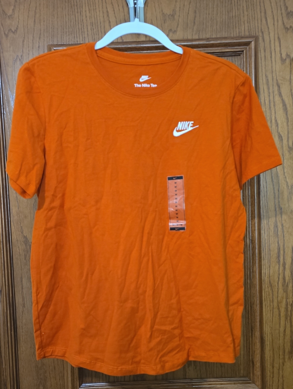 Nike Womens Orange T-Shirt with White Swoosh
